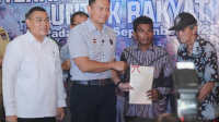 Jamin Kepastian Hukum, ATR/BPN Serahkan Sertipikat Tanah Ulayat di Padang